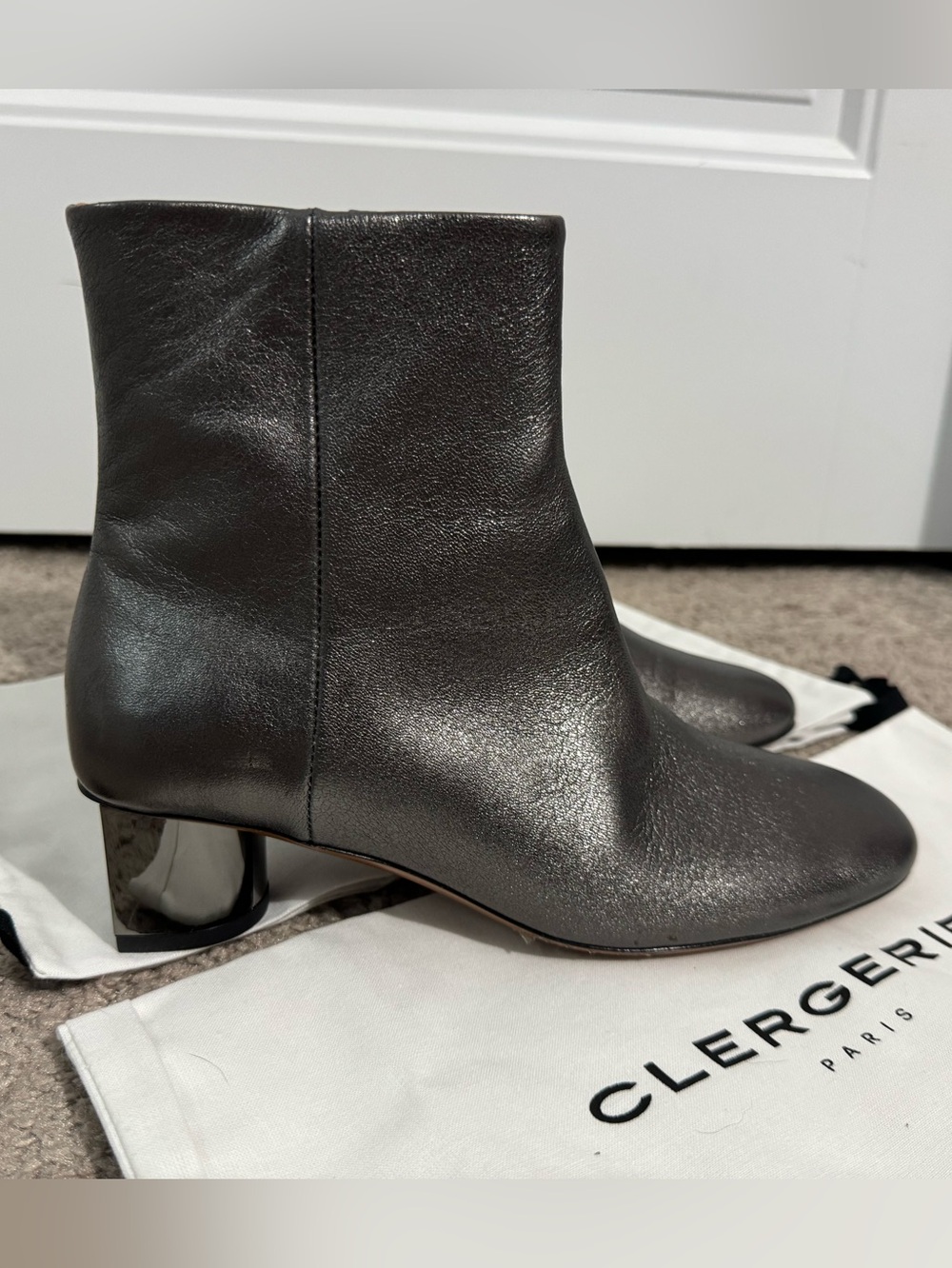 Beautiful Clergerie Paris size 37 6.5 gunmetal
Silver leather Paige booties new